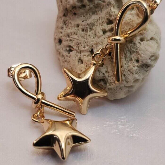 Aretes moñito estrella