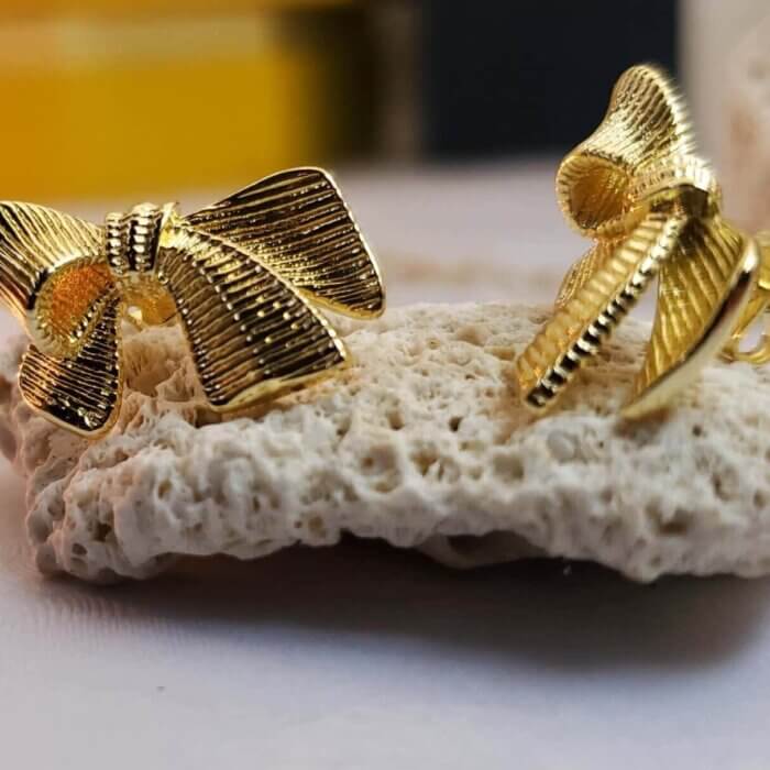 Aretes moñitos dorados